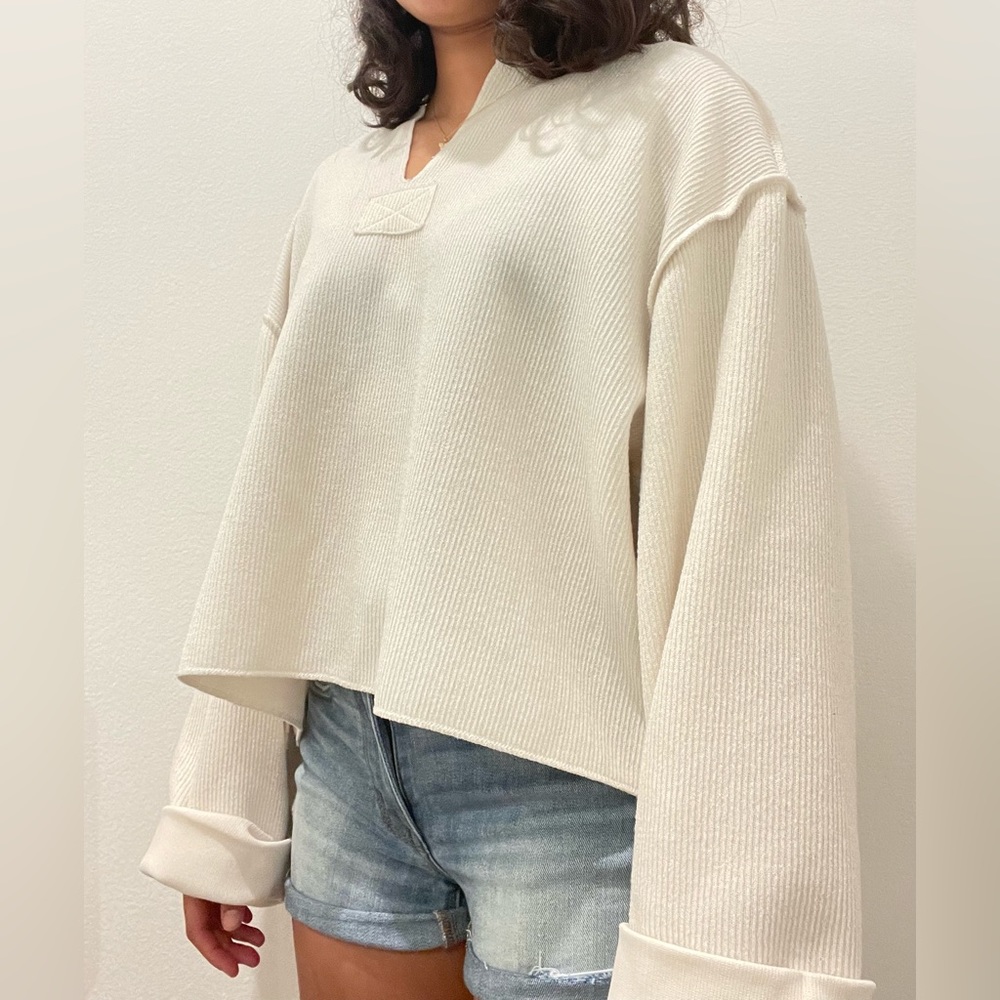 Cream colored long sleeve Urban Outfitters flowy shirt